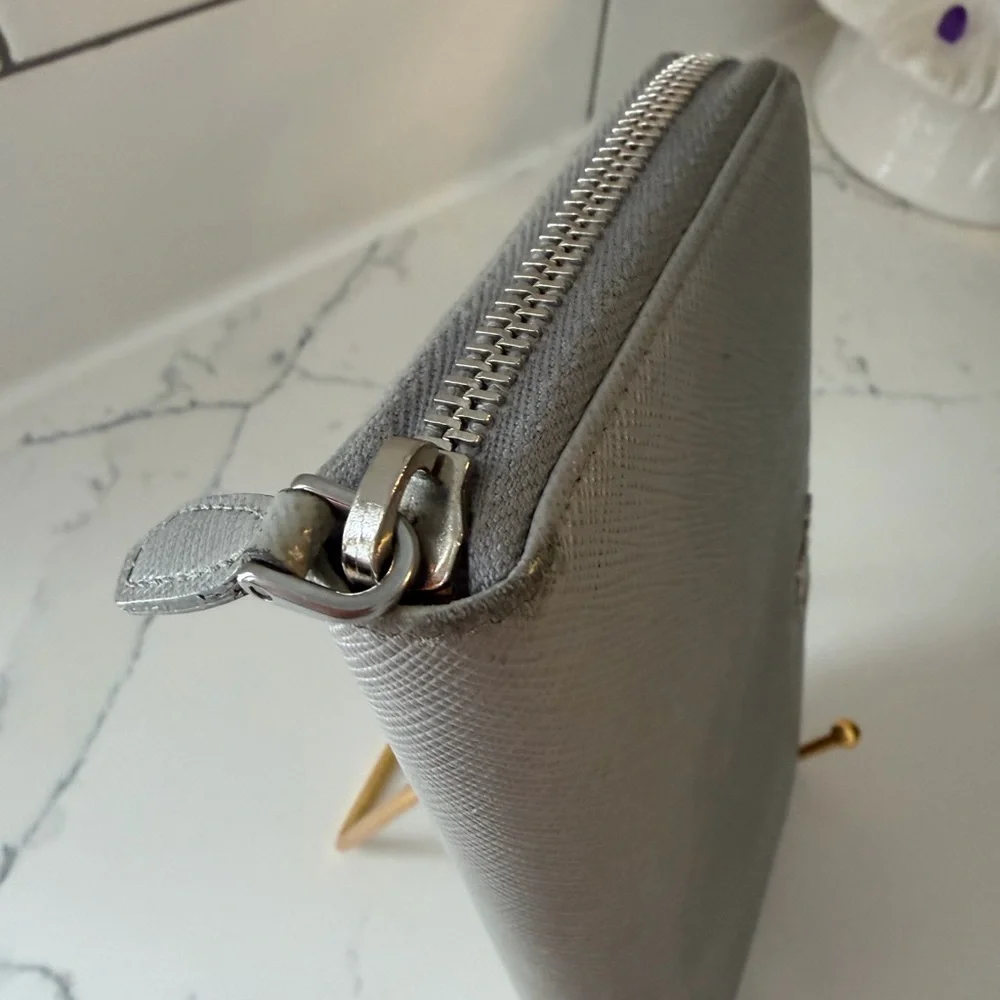 Authentic Prada Gray Leather wallet with mint interior